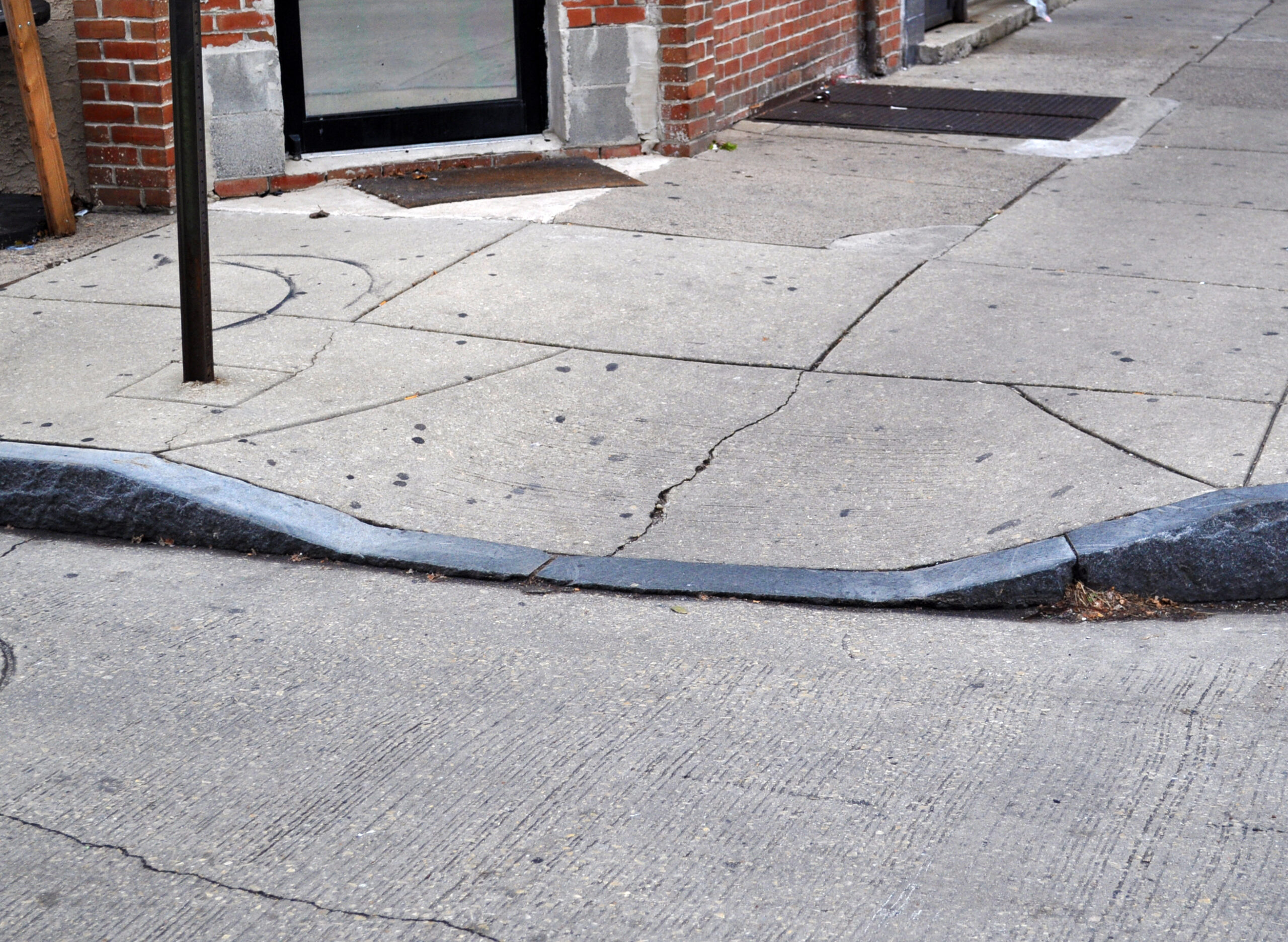 curb cut into the sidewalk