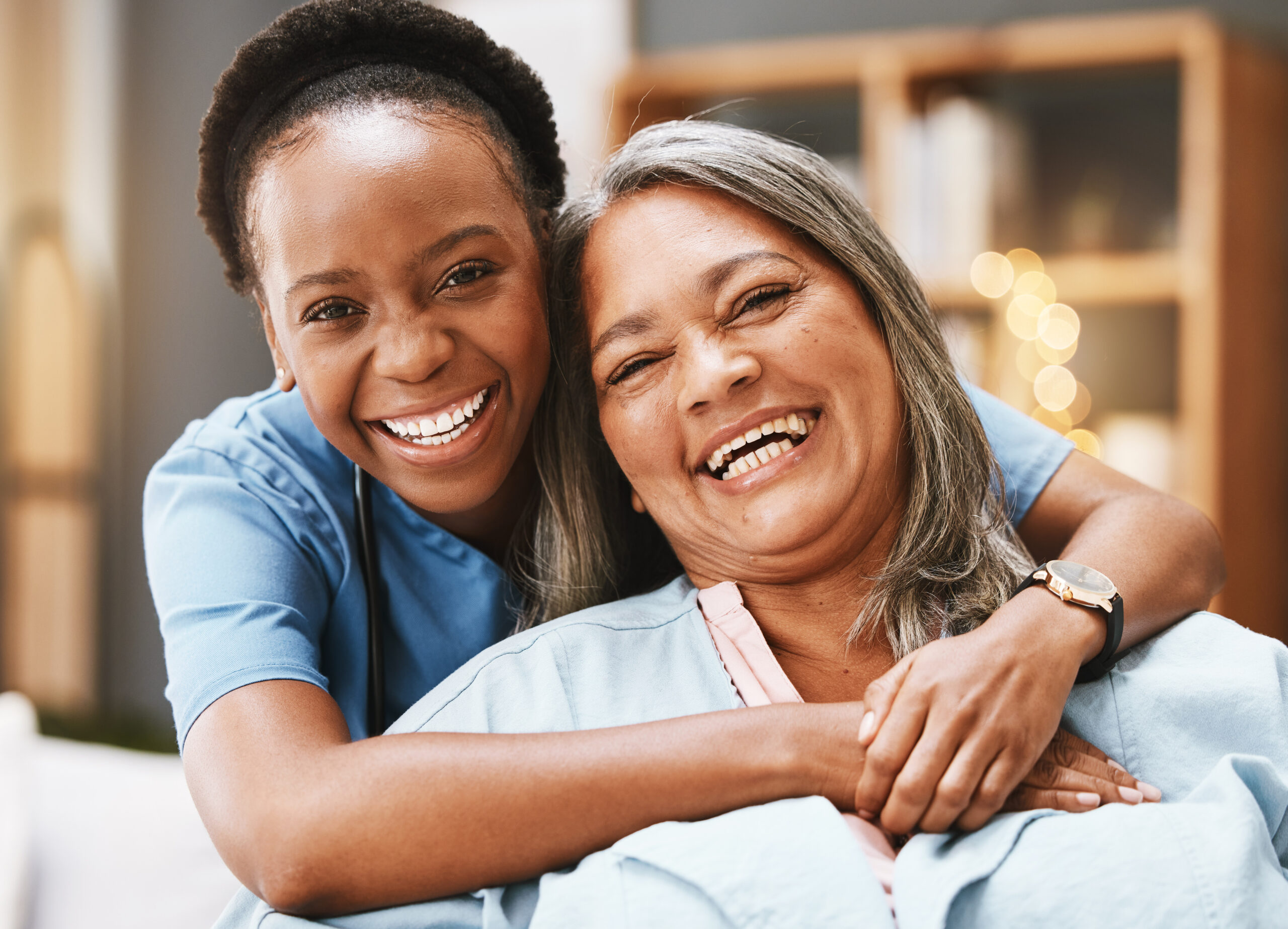 elder care, hug and portrait of nurse with patient for medical help, healthcare or physiotherapy. Charity, volunteer caregiver and face of black woman at nursing home for disability rehabilitation