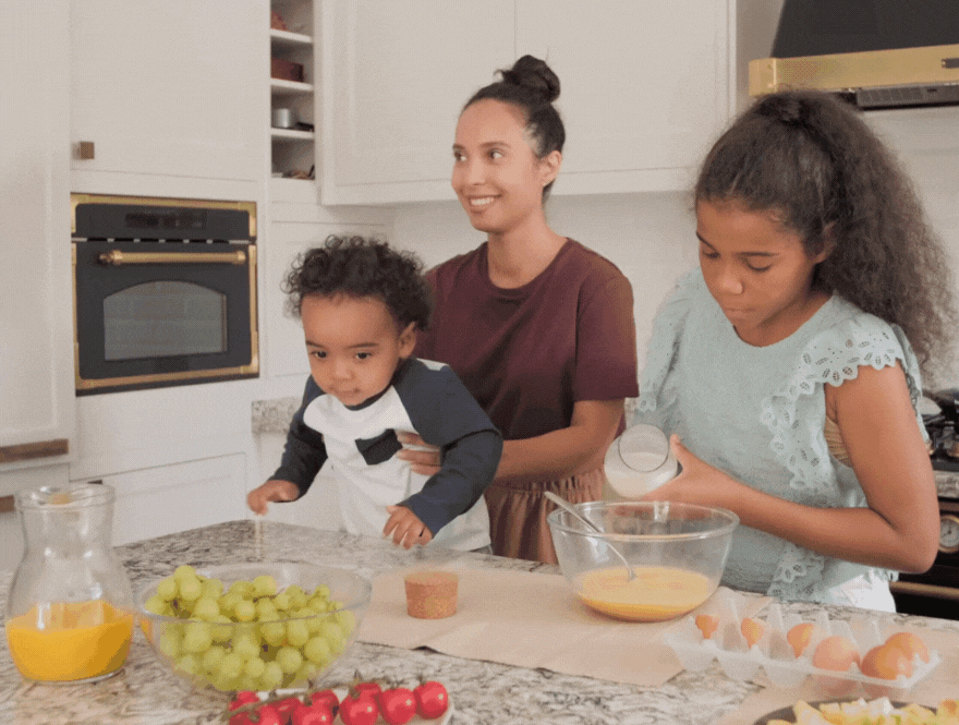 mom with toddler and older child parenting